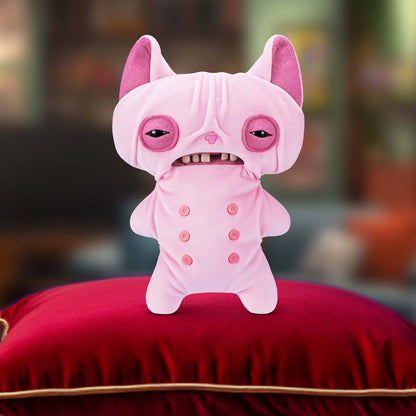 Fuggler Alley Cats Wrinkle McStinkles plush on a red pillow