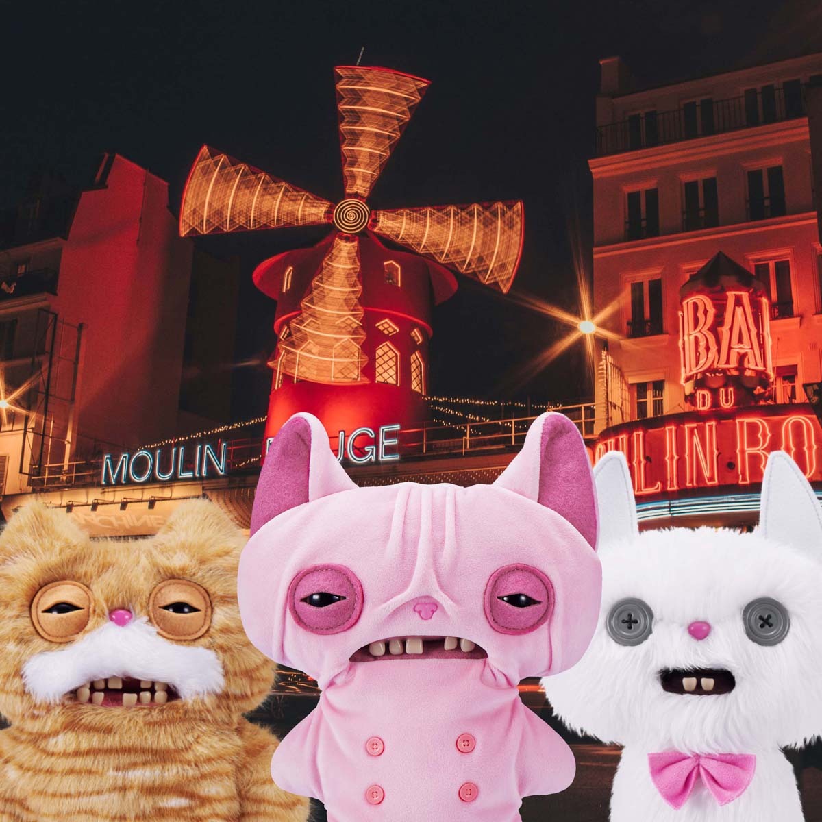 Three Fuggler Alley Cats characters in front of a Moulin Rouge windmill at night.