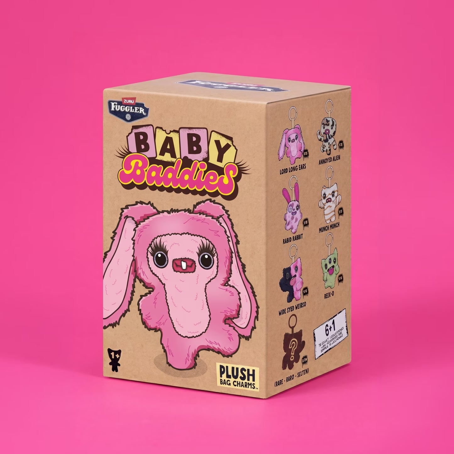 A cardboard mystery box for 'Fuggler's Baby Baddies' plush bag charms, featuring a pink bunny illustration on the front, set against a solid pink background.