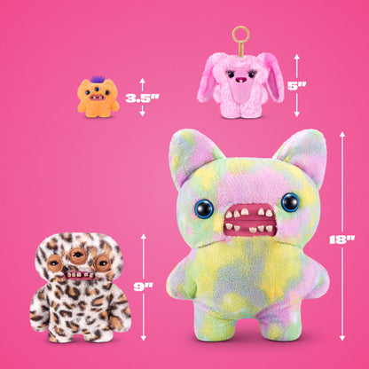 Three plush monster toys shown on a bright pink background with size arrows and labels: a small orange creature 3.5 inches tall, a small pink creature 5 inches tall, and a larger pastel tie-dye creature 18 inches tall.