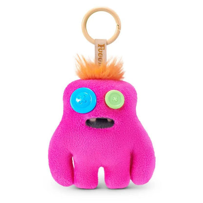 Fuggler Baby Pinkles keyring Sasquoosh, a 3.5 inch hot pink plush with mismatched button eyes and human teeth.