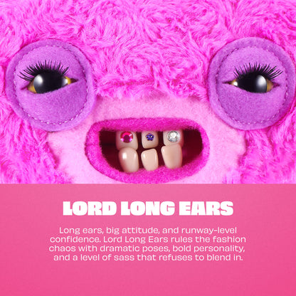 A close-up of a bright pink fuzzy monster face with large purple eye patches, black eyes with long lashes, and an open mouth showing teeth with rhinestones. Below the face is a pink text panel reading 'LORD LONG EARS' with descriptive text.