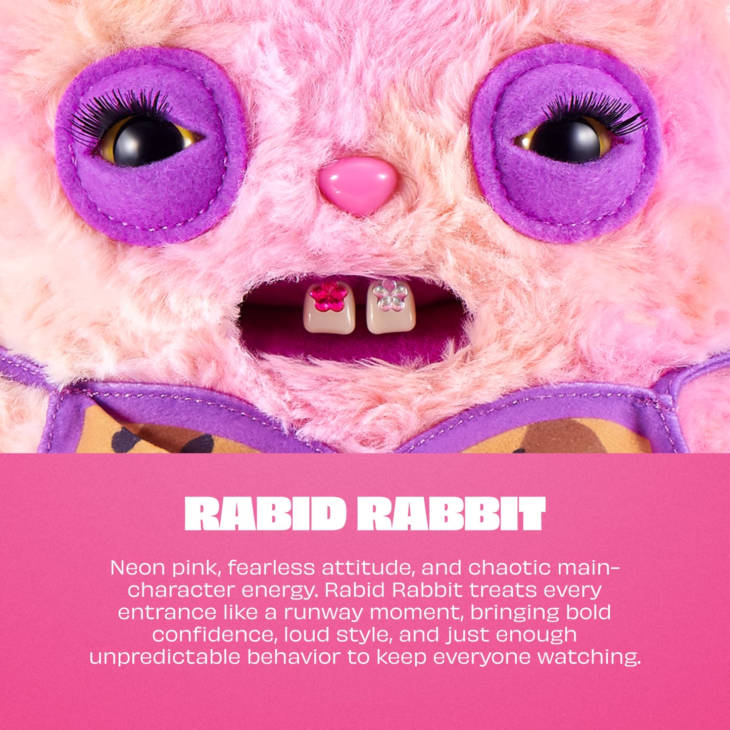 A close-up of a fuzzy pink character toy with oversized purple eye circles, a pink nose, and an open mouth showing two small teeth with rhinestones. Text below reads 'RABID RABBIT' with descriptive copy on a pink background.