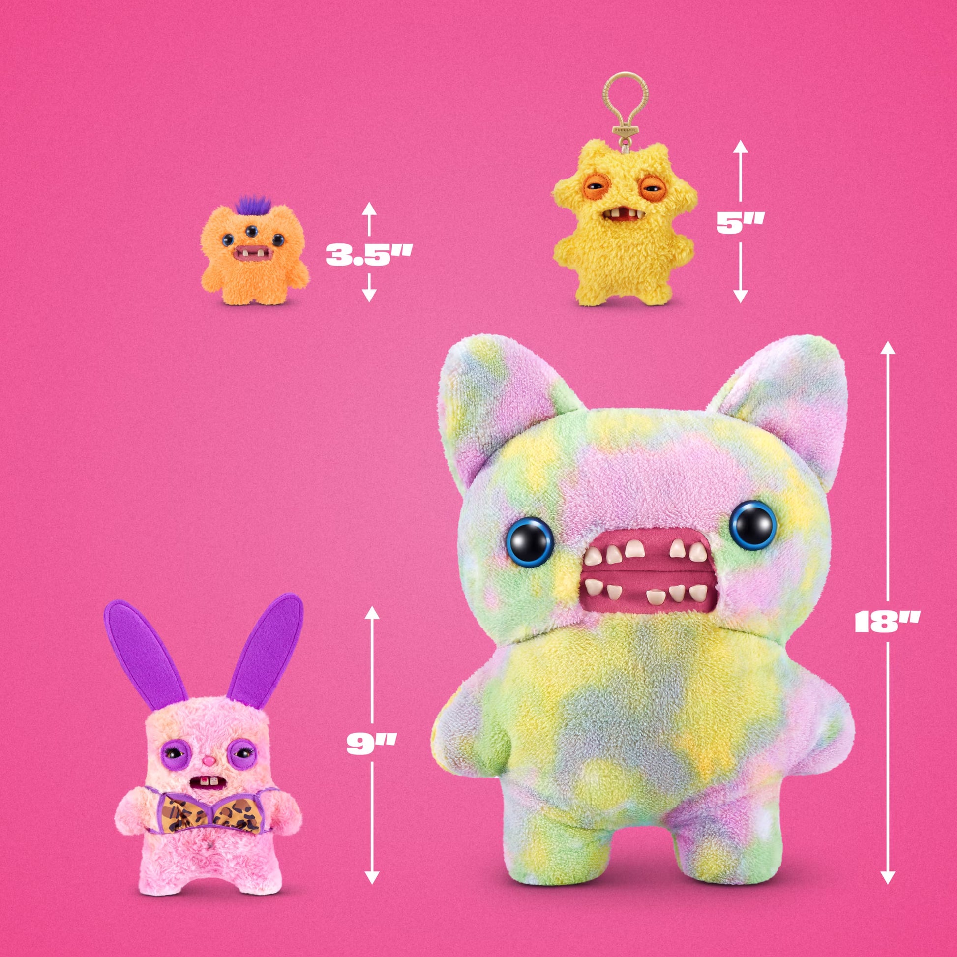 A colorful plush monster toy shown on a pink background with size callouts for three variants: a small orange one labeled 3.5 inches, a small yellow one labeled 5 inches, and a larger pastel tie-dye one labeled 18 inches.