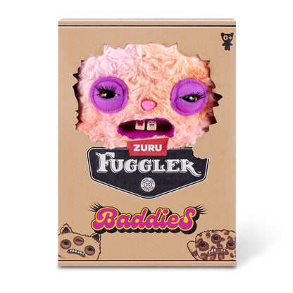 The product packaging for the Zuru Fuggler 'Baddies' plush toy, featuring a cardboard box with a die-cut window showing a pink fuzzy monster with purple eyes and a pink nose.
