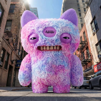 Fuggler Big Fuggs Series 2 Annoyed Alien jumbo 18-inch plush featuring purple fur, long purple hair, three eyes, pointed ears, and human-like teeth.