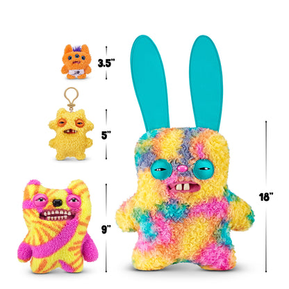 Size comparison A Fuggler Bigg Fugg 18-inch Rabid Rabbit plush toy, featuring rainbow tie-dye curly fur, large upright turquoise ears, squinting turquoise eyelids, and two large white teeth showing.