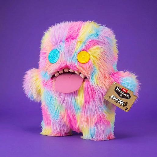 Fuggler Bigg Fugg Oogah Boogah 18-Inch Plush featuring pastel tie-dye fur, mismatched button eyes, a pink tongue, and human-like teeth.