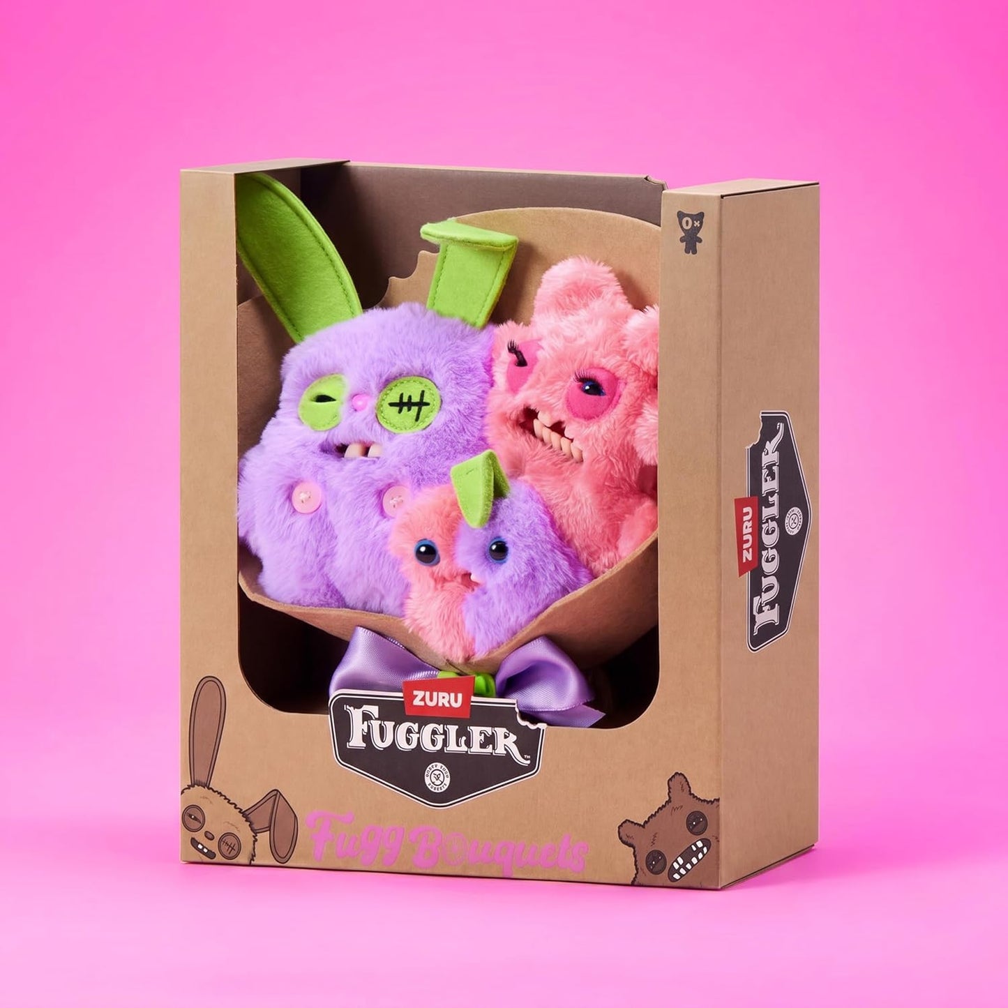 Fuggler Bouquets Plush Set featuring two 9-inch and one 3.5-inch colorful monster plush toys wrapped in craft paper with a purple ribbon.