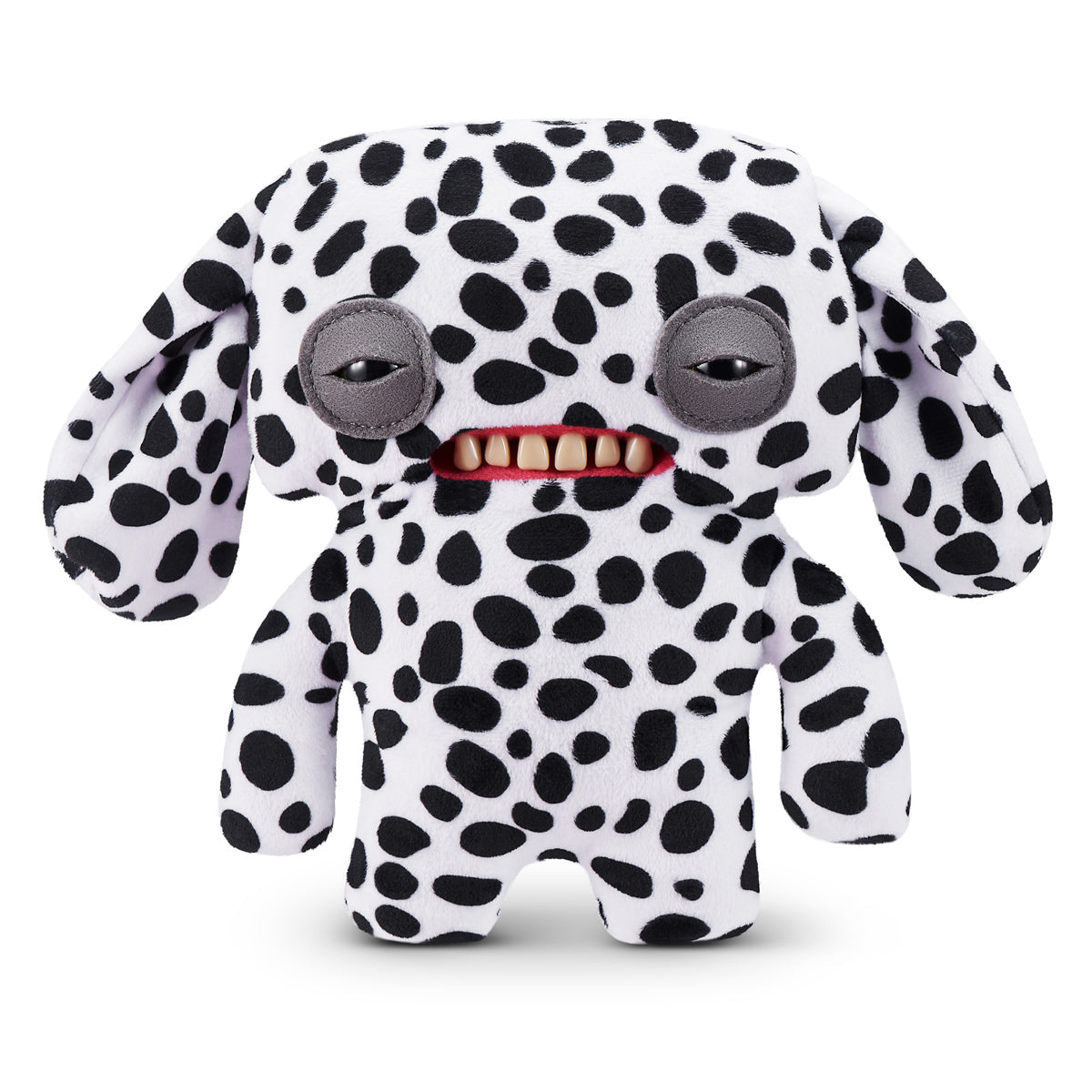 A 9-inch Fuggler Butt Ugly Pet (Annoyed Alien Dalmatian) plush toy. It has white fabric with black Dalmatian spots, long floppy ears, squinting grey eyelids, and a mouth with realistic human teeth.