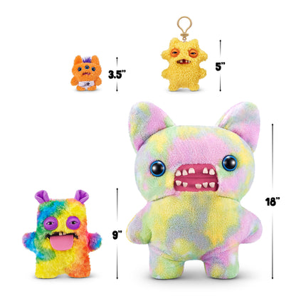 Fuggler size comparison for A 9-inch Fuggler Butt Ugly Pet (Cheeky Chonky Guinea Pig) plush toy. It has shaggy rainbow-colored fur, pointy purple ears, squinting purple eyelids, two human-like teeth, and a large pink felt tongue sticking out.