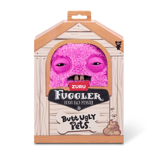 A 9-inch Fuggler Butt Ugly Pet (Rabid Rabbit Bunny) plush toy. It has shaggy, bright pink fur, long floppy pink ears, squinting stitched eyes, and a mouth with realistic human teeth in a display box. 