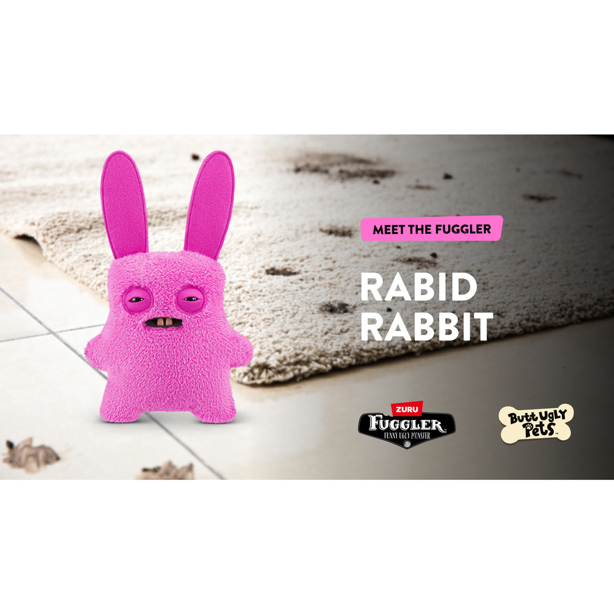 Pink toy resembling a rabbit with text 'Meet the Fuggler Rabid Rabbit' on a neutral background.