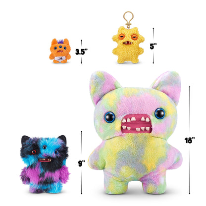 Size chart for A 9-inch Fuggler Butt Ugly Pet (Reek-O Black Cat) plush toy. It has shaggy blue, purple, and black fur, black cat ears, three eyes (one red, two blue), and a small mouth with realistic human teeth.