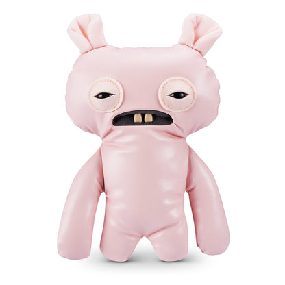 A 9-inch Fuggler Butt Ugly Pet (Uncladimir Tootin Hairless Rat) toy. It is made of smooth pink faux leather, with large rat ears, squinting stitched eyes, and two large human-like teeth.