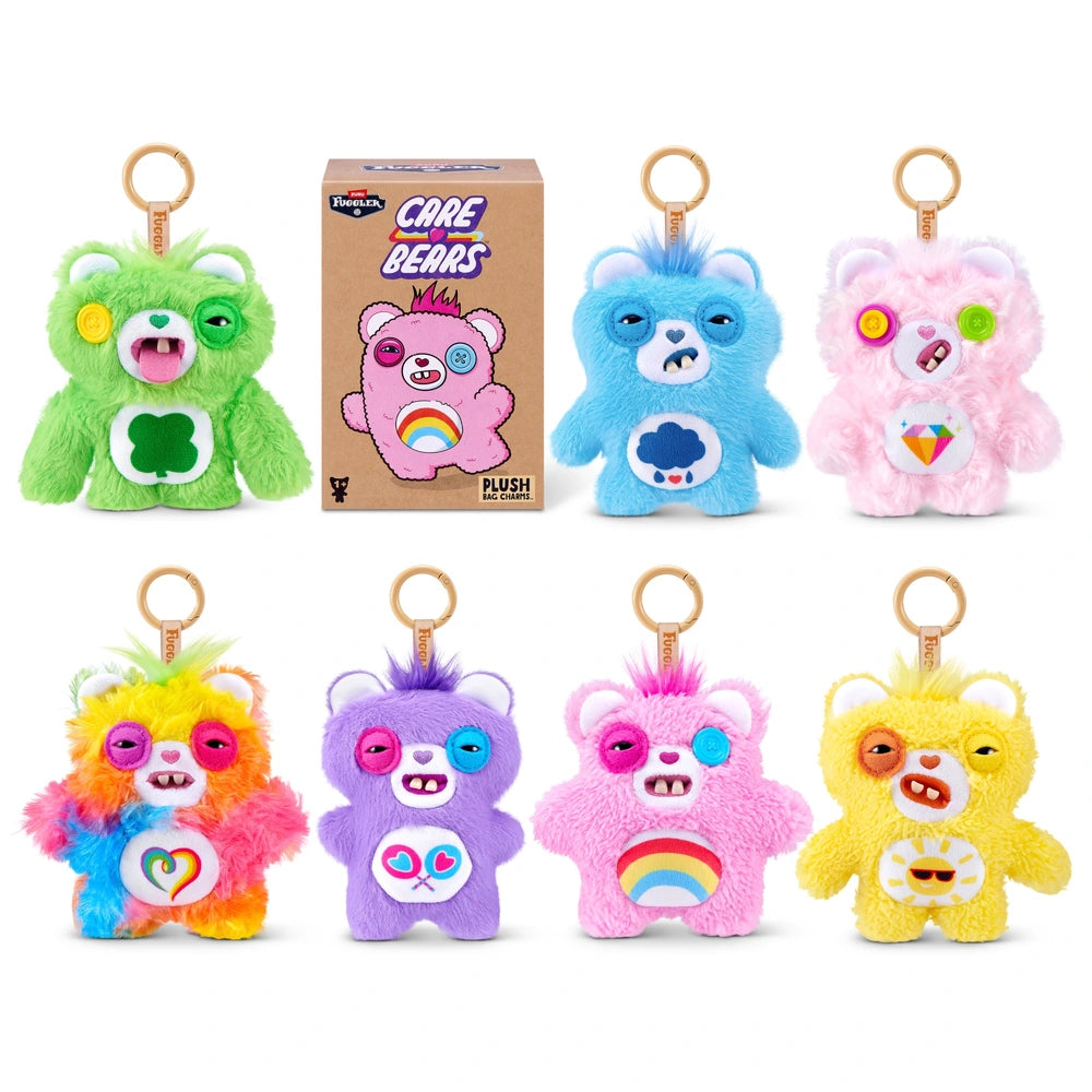 Fuggler Care Bears blind box packaging alongside an assortment of plush bag charms featuring Care Bear designs and human-like teeth.