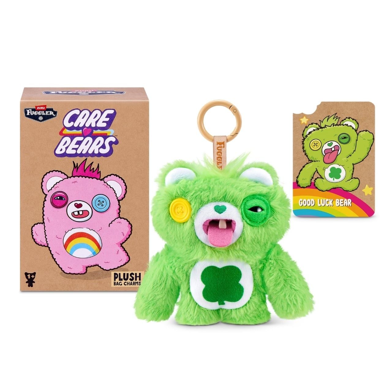 Fuggler Care Bears blind box packaging alongside an assortment of plush bag charms featuring Care Bear designs and human-like teeth.