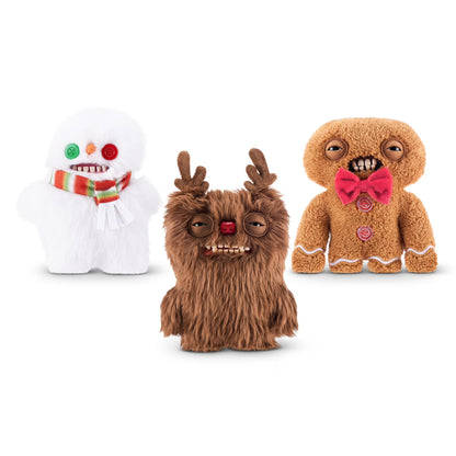Fuggler Festive Fuggs Series 1 Reindeer 9-inch plush featuring shaggy brown fur, felt antlers, a red nose, heavy-lidded eyes, and human-like teeth.