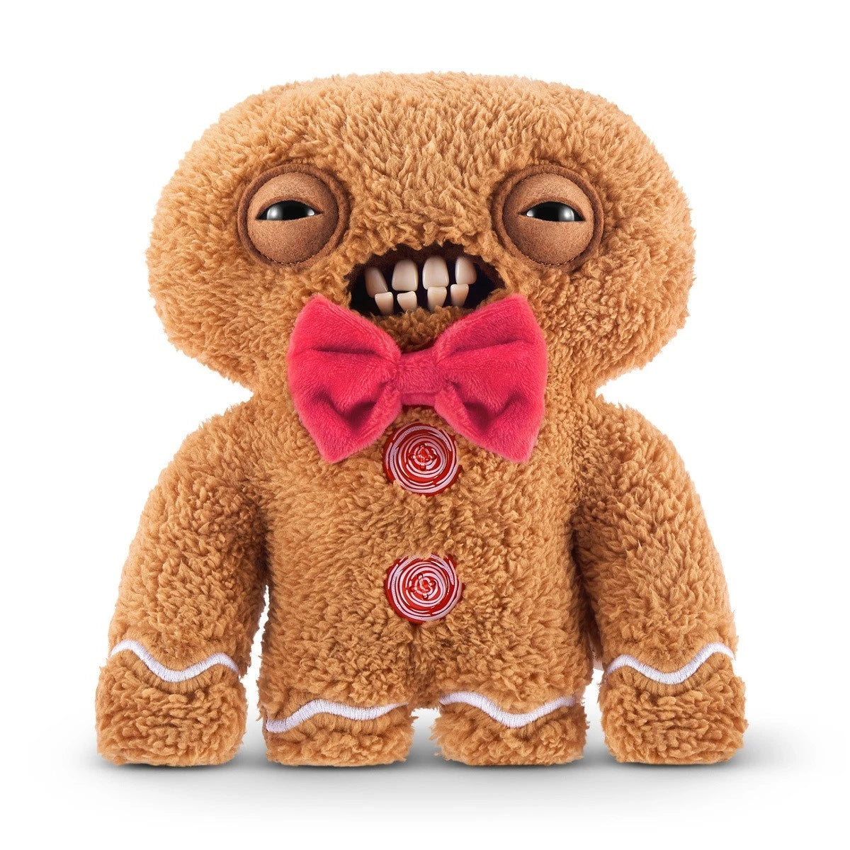 Fuggler Festive Fuggs Series 1 Gingerbread 9-inch plush featuring brown fur, a red bow tie, white icing squiggles, red swirl buttons, and human-like teeth.