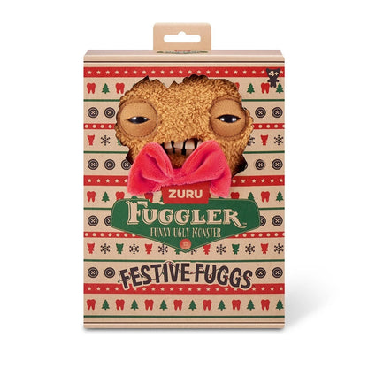 Fuggler Festive Fuggs Series 1 Gingerbread 9-inch plush featuring brown fur, a red bow tie, white icing squiggles, red swirl buttons, and human-like teeth.