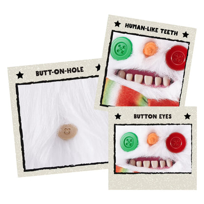 Fuggler Festive Fuggs Series 1 Snowman 9-inch plush featuring fluffy white fur, a red, green, and white striped scarf, mismatched button eyes, and human-like teeth.