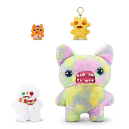 Fuggler Festive Fuggs Series 1 Snowman 9-inch plush featuring fluffy white fur, a red, green, and white striped scarf, mismatched button eyes, and human-like teeth.
