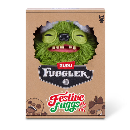 Zuru Fuggler 'Festive Fuggs' collectible plush toy in its original brown cardboard packaging, featuring a green furry character with a Santa hat peeking through a cutout window.