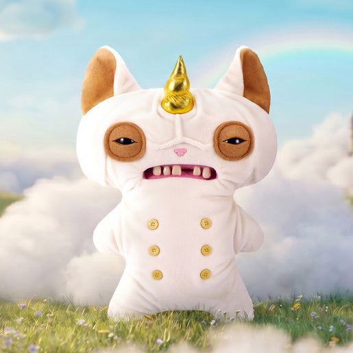 Fuggler Fugglercorns Wrinkle McStinkles plush toy with wrinkled white fur, a metallic gold unicorn horn, sleepy brown eyes, human-like teeth, and six gold buttons on its belly in a fantasy setting with rainbow and clouds.