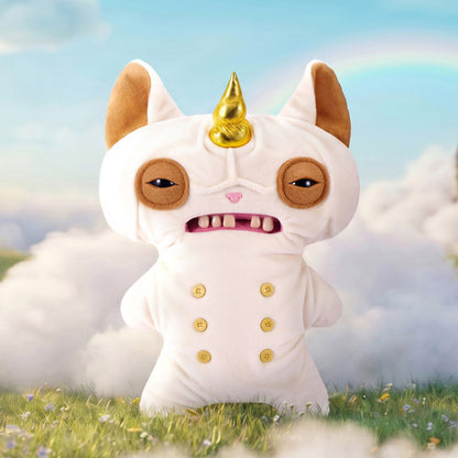Fuggler Fugglercorns Wrinkle McStinkles plush toy with wrinkled white fur, a metallic gold unicorn horn, sleepy brown eyes, human-like teeth, and six gold buttons on its belly in a fantasy setting with rainbow and clouds.