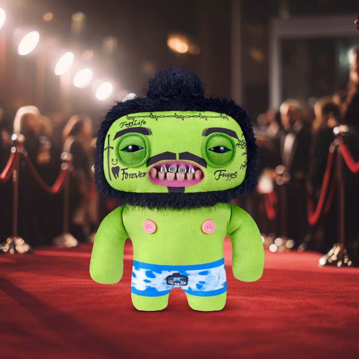 Fuggler Fuggstars Series 1 Rhymer McSlimer plush with a red carpet event in the background