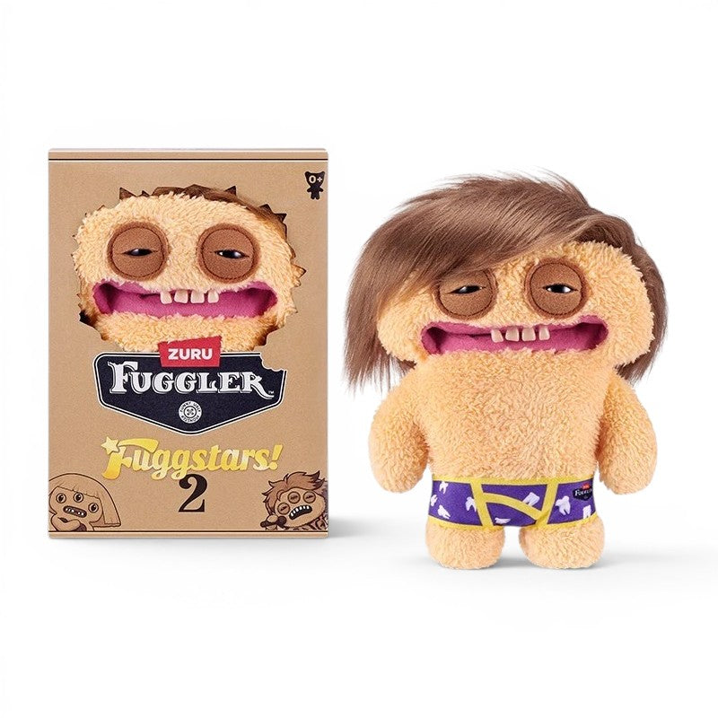 Fuggler Fuggstars Series 2 Fuggbieb plush wearing purple and yellow boxers with swoopy brown hair, mismatched eyes, and human-like teeth.