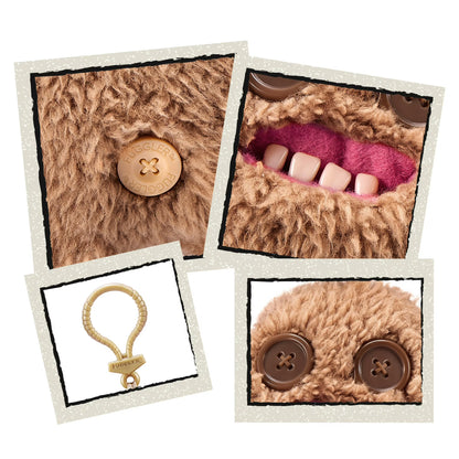 close up of Fuggler Series 5 Sir Splodge-A-Lot 5-inch keyring plush in Brown variation, featuring fuzzy brown fur, button eyes, and human-like bottom teeth.