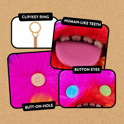 close up of features Fuggler Series 6 Oogah Boogah 5-inch keyring plush in Rainbow variation, featuring neon pink, orange, and yellow fur, mismatched button eyes, and a sticking out tongue.