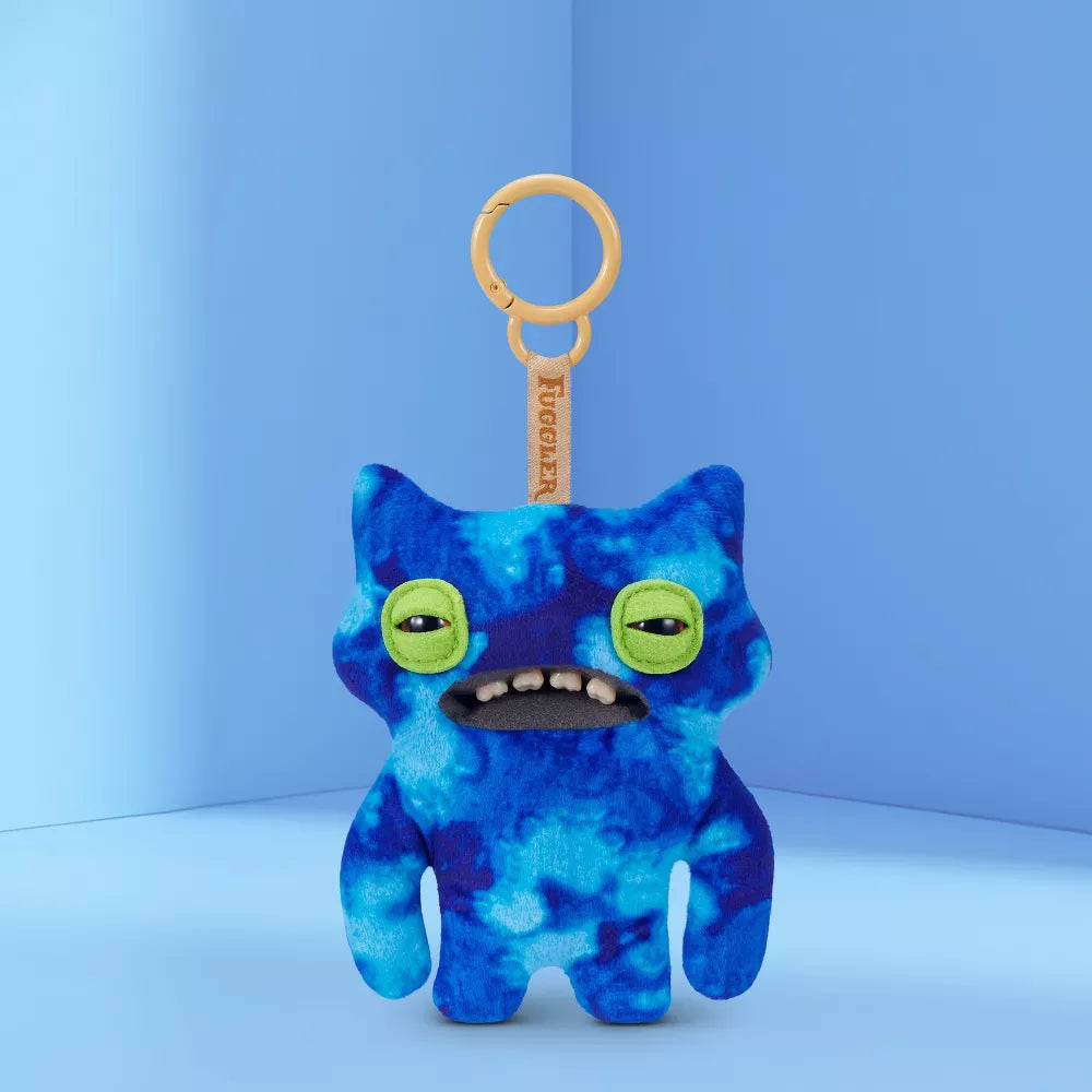 Fuggler Series 6 Wide Eyed Weirdo 5-inch keyring plush in Blue variation, featuring blue and black tie-dye felt fur, green slitted eyes, and pointy ears.