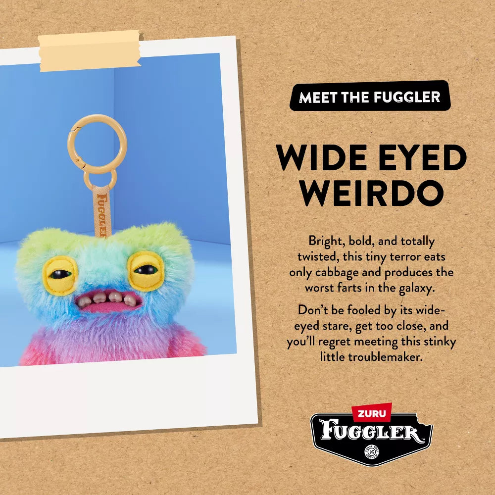 Colorful toy with wide eyes and a keychain, displayed on a cardboard background with text and Zuru logo.