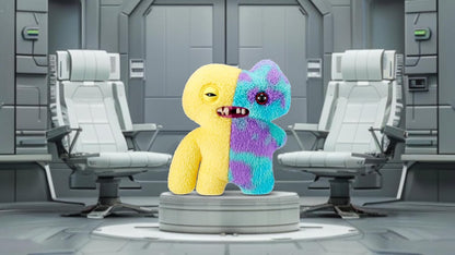Two colorful plush toys in a futuristic room with gray chairs and panels.
