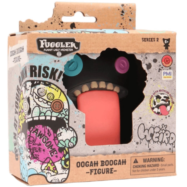 Fuggler Oogah Boogah 4.5-inch figure in Midnight black, featuring mismatched purple and blue button eyes and a giant pink tongue.