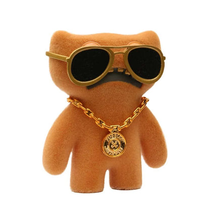 Fuggler Series 3 Gold Edition Gnawing Terror 4.5-inch tan flocked figure with gold aviator sunglasses and a gold medal chain accessory.