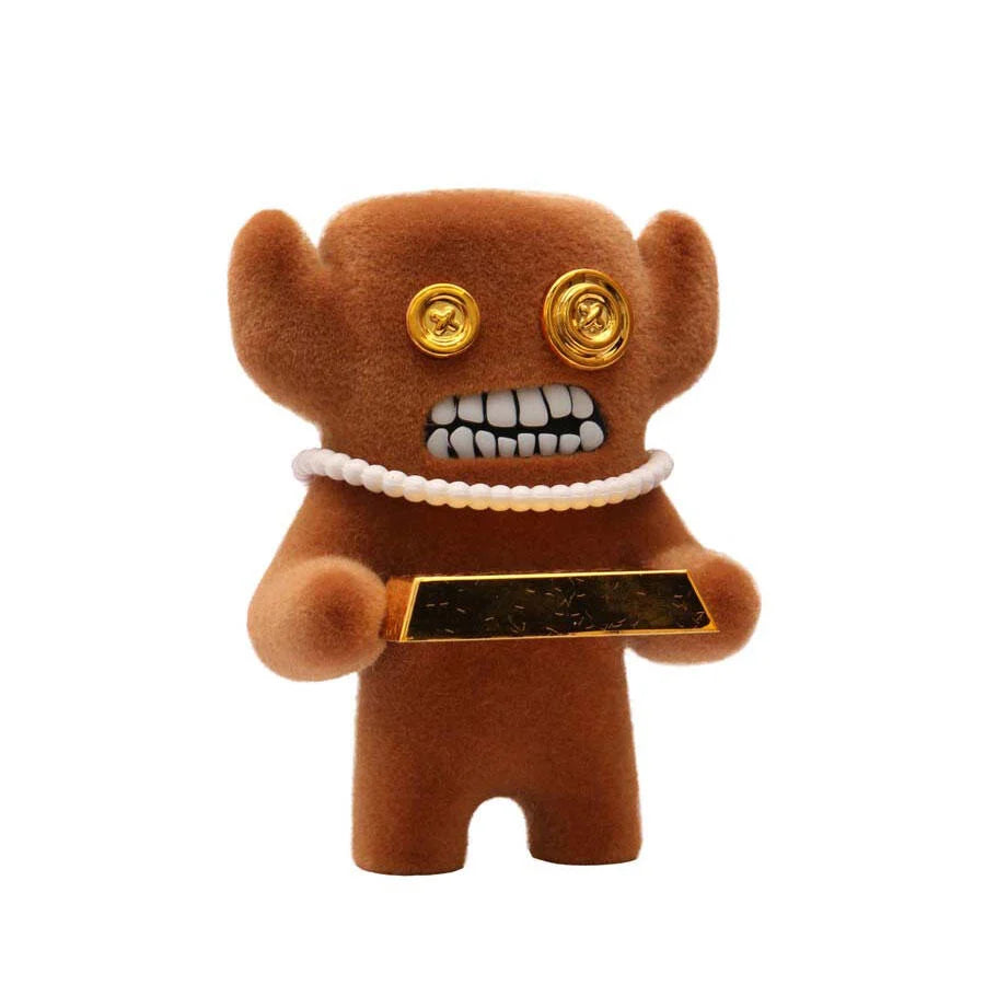 Fuggler Series 3 Gold Edition Grump Grumps 4.5-inch brown flocked figure with gold button eyes holding a gold bar accessory.