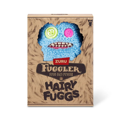 Hairy Fuggs Sasquoosh Fuggler plush with vibrant blue fur and pink tuft in display box