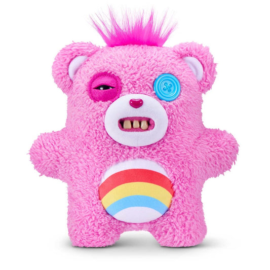 Fuggler x Care Bears Cheer Bear plush, a pink bear with human-like teeth, one blue button eye, and a rainbow belly badge.