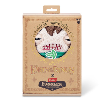 The Fuggler x Lord of the Rings Frodo plush inside its collector box, featuring the gold Elven script and Lord of the Rings logo.