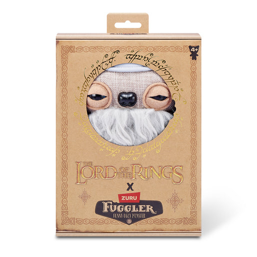 The Fuggler x Lord of the Rings Gandalf plush inside its collector box, featuring "The Lord of the Rings" logo and gold Elvish script details on the packaging.