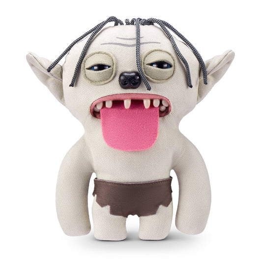 A product shot of the Fuggler x Lord of the Rings Gollum 9-Inch plush toy, featuring a beige body, long pink tongue, and exposed human-like teeth on a white background.