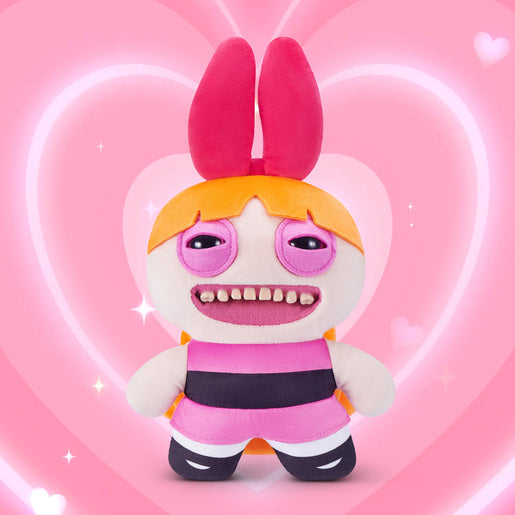 Fuggler x Powerpuff Girls Blossom plush on a pink heart background
