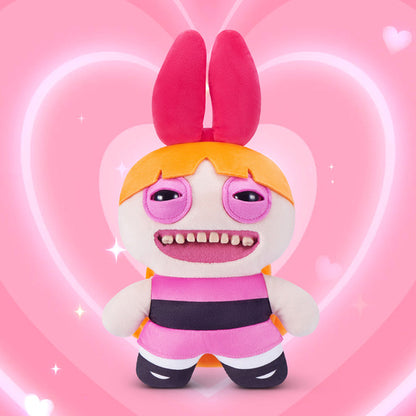 Fuggler x Powerpuff Girls Blossom plush on a pink heart background