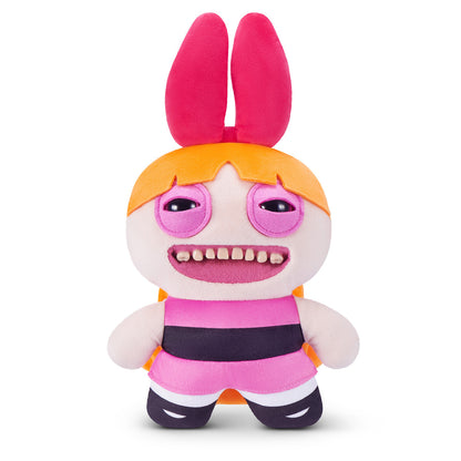 Fuggler x Powerpuff Girls Blossom plush, a pink doll with orange hair, a large red bow, and human-like teeth.
