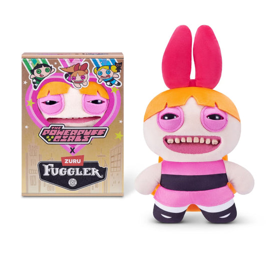 The Fuggler x Powerpuff Girls Blossom plush toy displayed next to its collector box, featuring a large red bow, pink eyes, and a funny ugly monster expression.