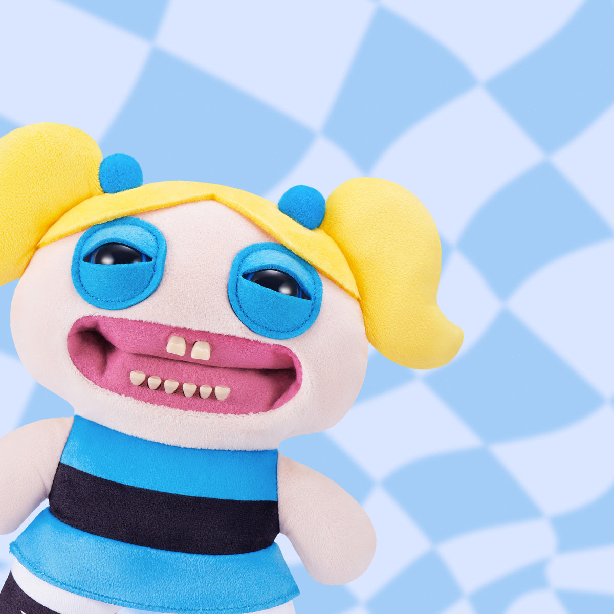 Fuggler x Powerpuff Girls Bubbles plush on checkered blue background