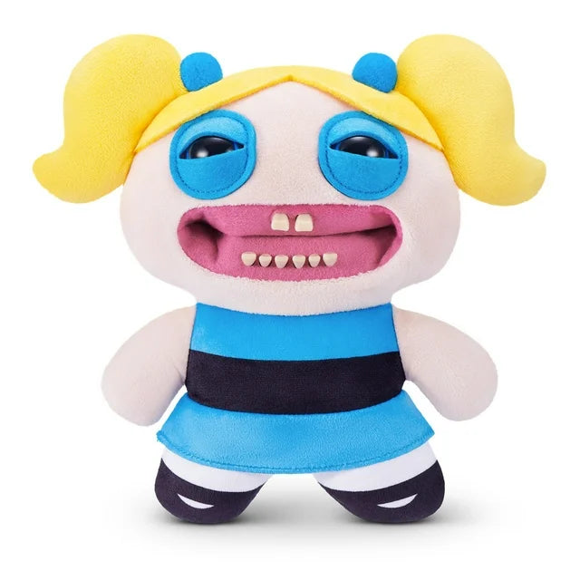 The Fuggler x Powerpuff Girls Bubbles plush toy, featuring blonde pigtails, blue eyes, and a signature toothy grimace.